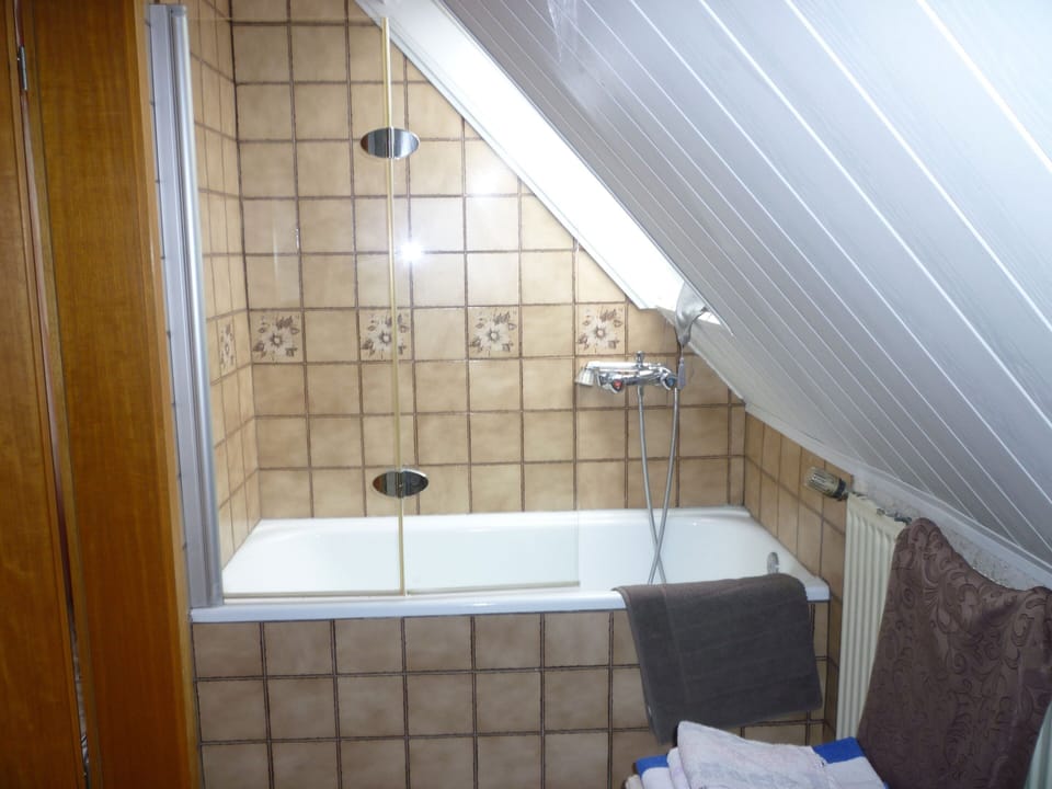 Quadruple Room | Bathroom | Hair dryer, towels, toilet paper