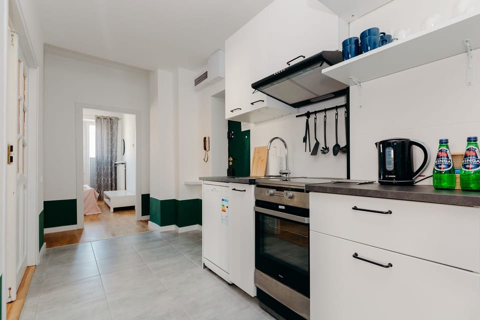 Exclusive Apartment | Private kitchen | Full-size fridge, oven, stovetop, electric kettle