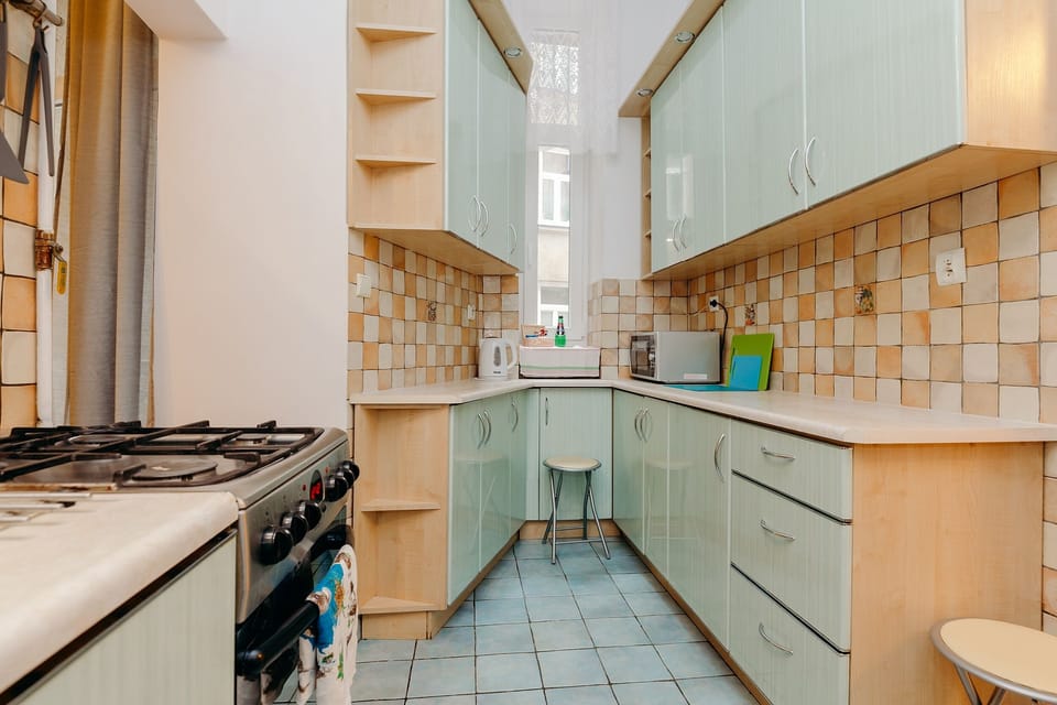 Comfort Apartment | Private kitchen | Full-size fridge, microwave, oven, stovetop