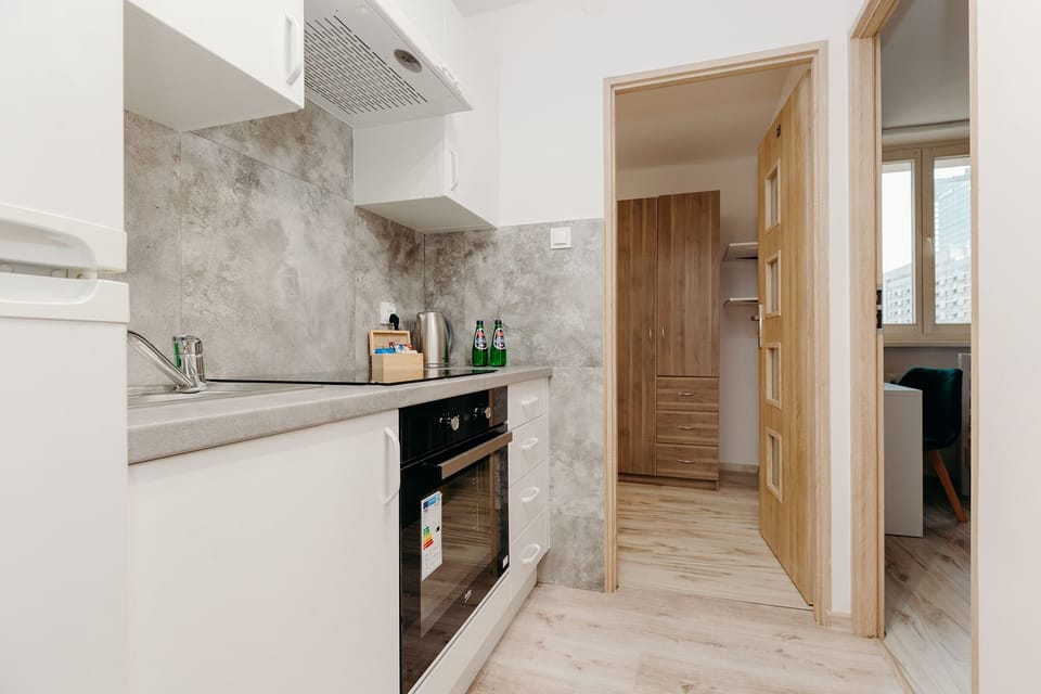 Apartment | Private kitchen | Full-size fridge, microwave, oven, stovetop