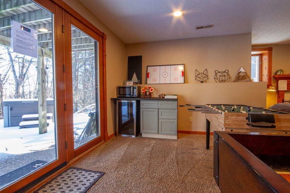 Lower level living room with games for the kids