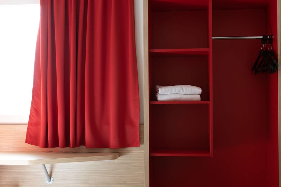 Desk, laptop workspace, blackout drapes, soundproofing