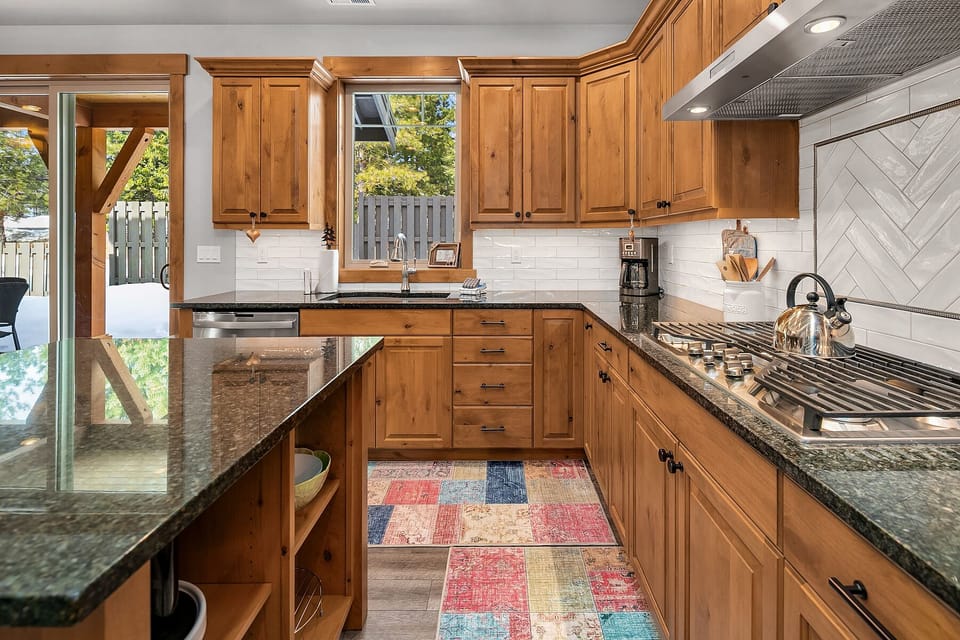 Big Bear Cabin: - Fully stocked chef's kitchen with a gas cooktop.