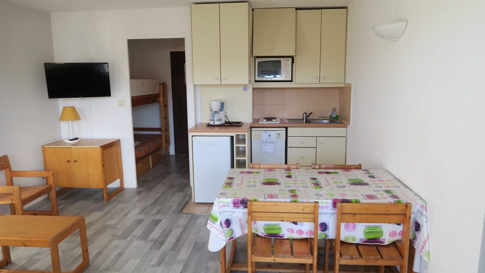 Studio sleeps 4 with a view of its functional kitchen area