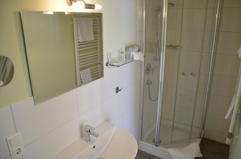 Combined shower/tub, hair dryer