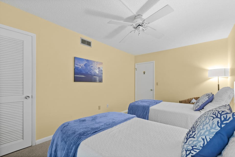 Bright and cozy bedroom with calming blue accents