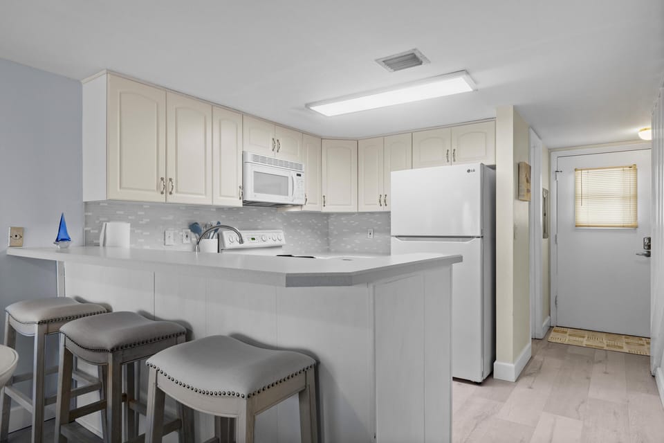 Bright, airy kitchen with ample seating for gatherings