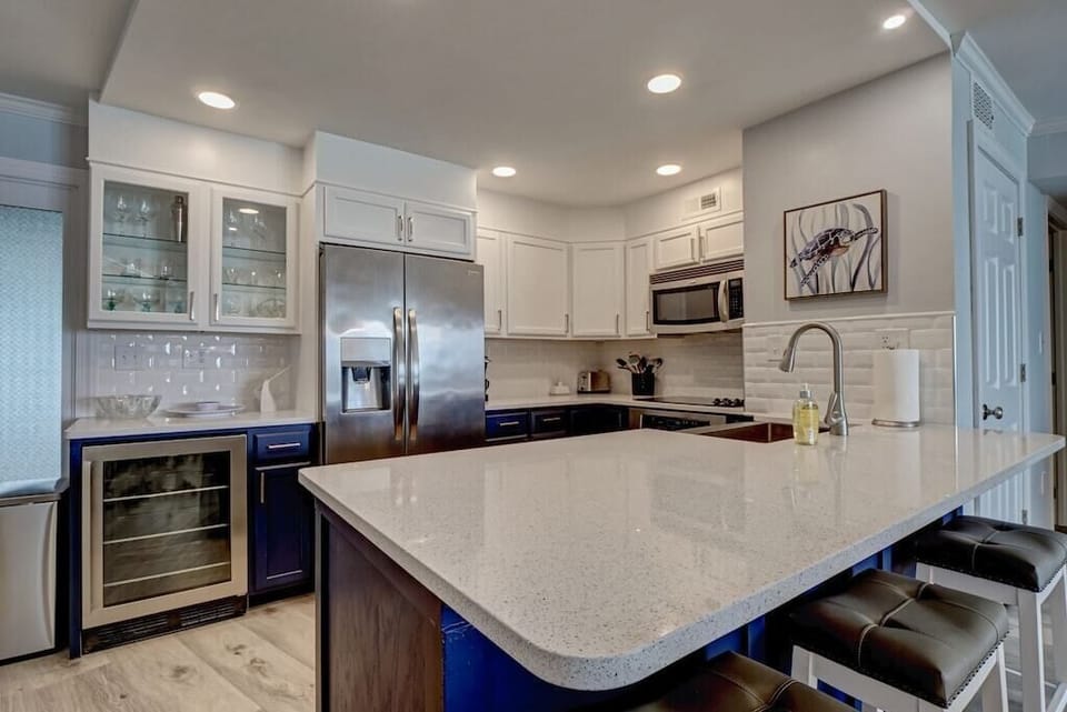 The beverage fridge allows more room in the regular fridge