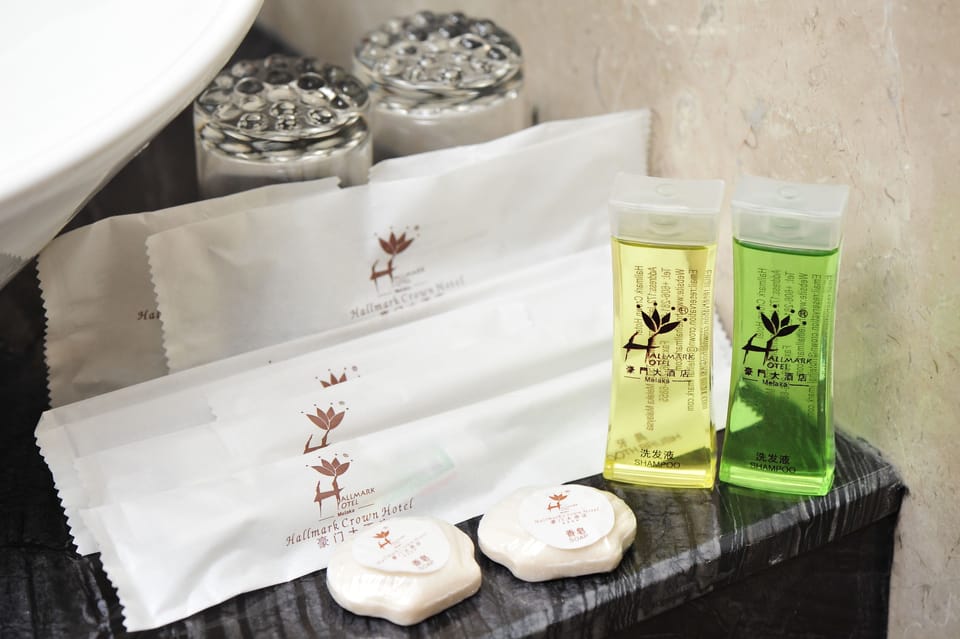 Rainfall showerhead, designer toiletries, hair dryer, slippers