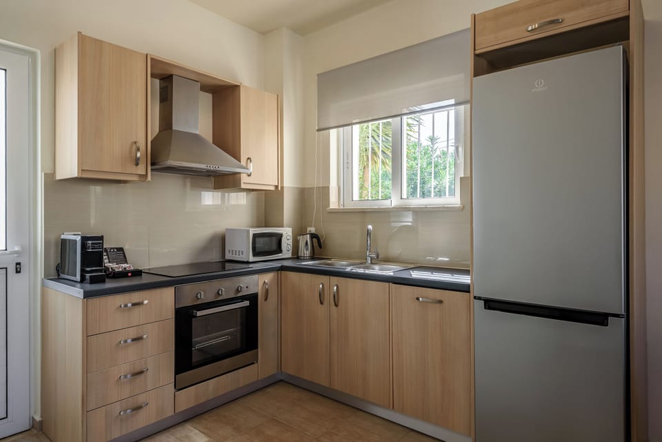 Villa, 2 Bedrooms | Private kitchen | Full-size fridge, microwave, oven, stovetop