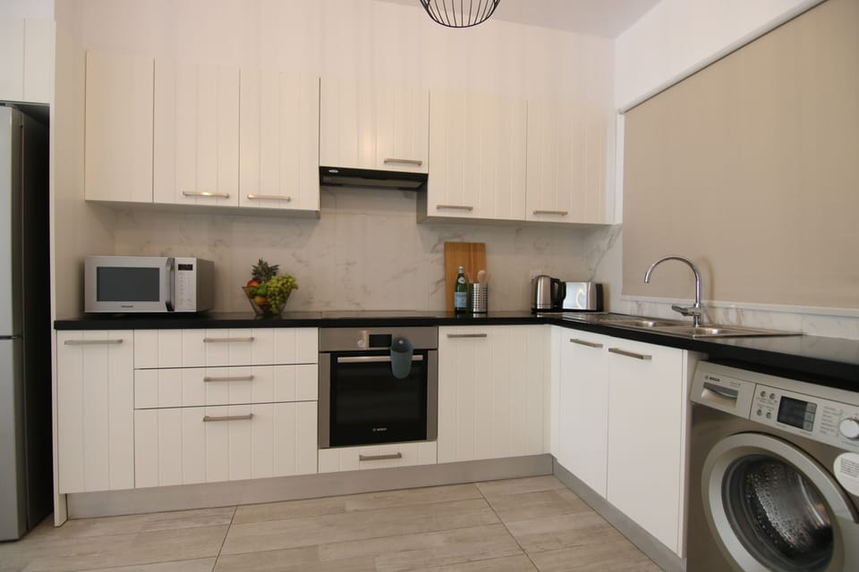 Apartment | Private kitchen | Fridge, coffee/tea maker, electric kettle