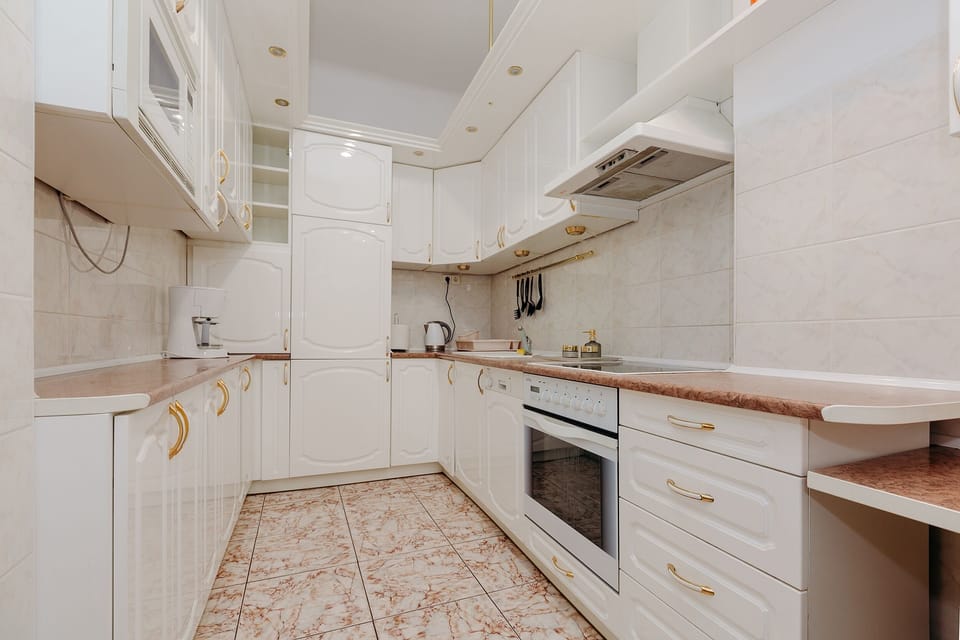 Comfort Apartment | Private kitchen | Full-size fridge, microwave, oven, stovetop