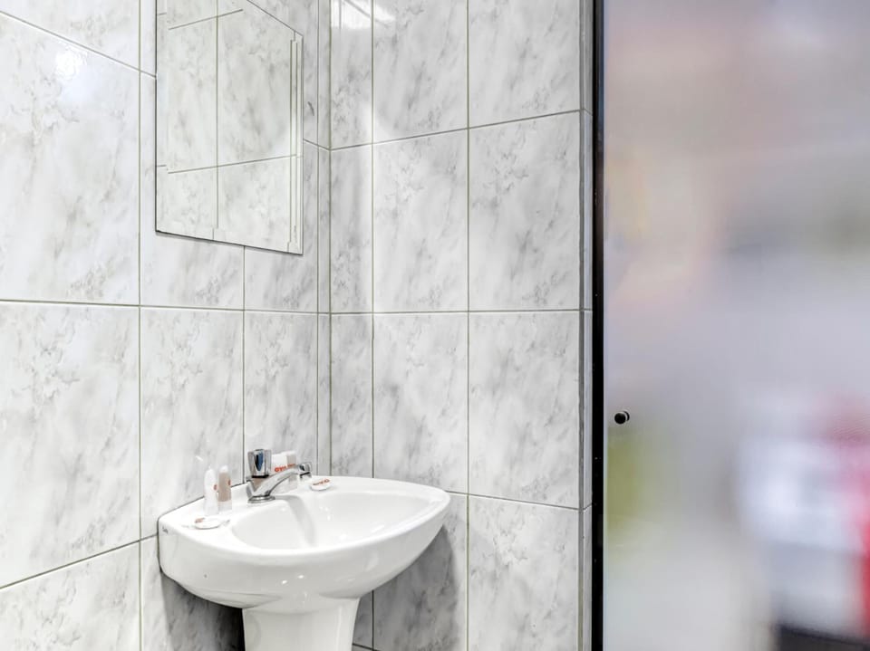 Shower, towels, toilet paper