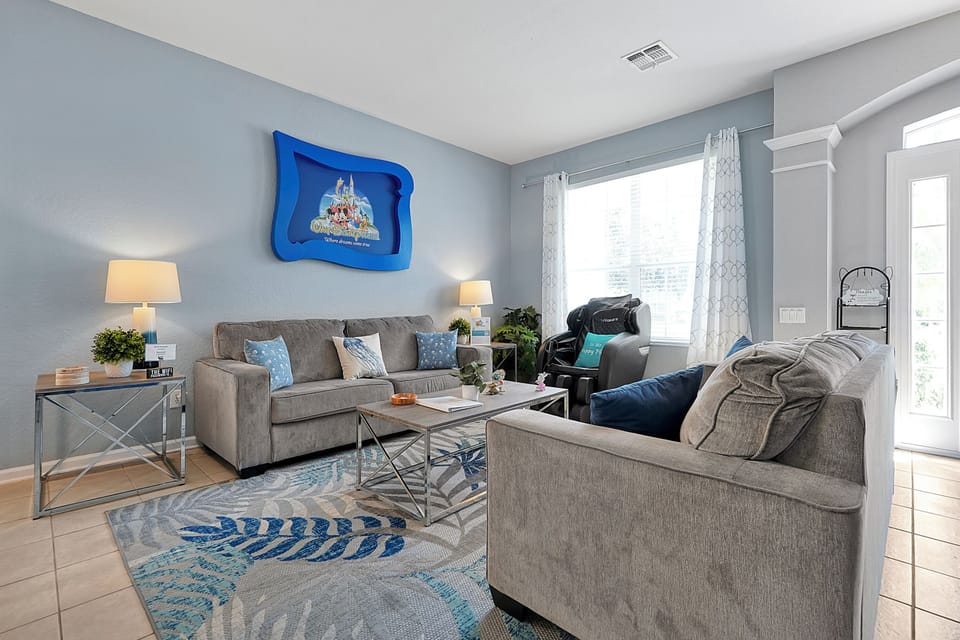 Front living room with special framed painting from Disney World's Cinderella's castle.