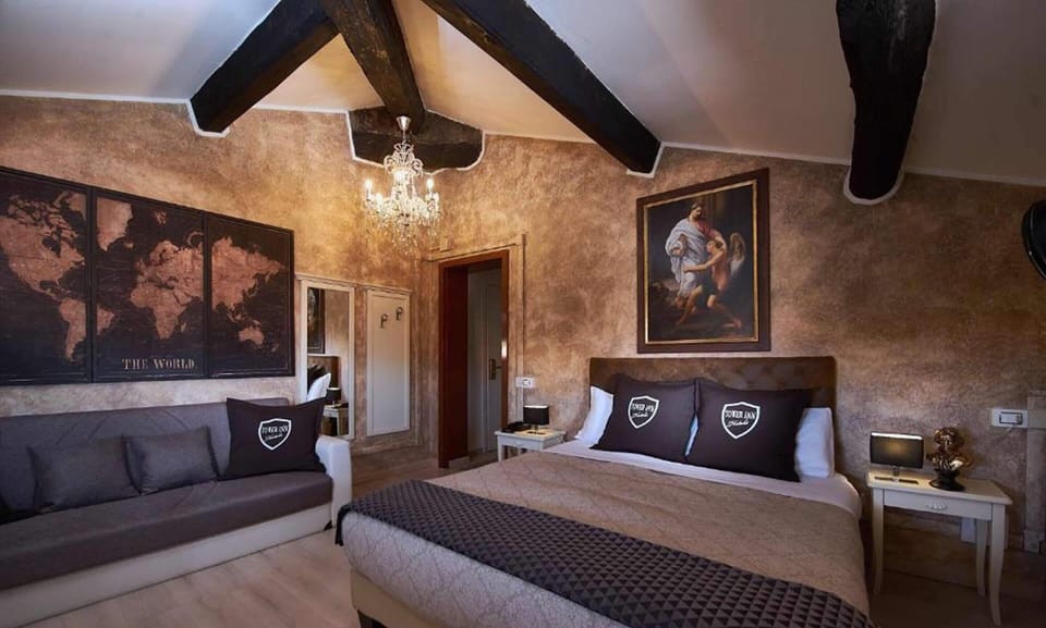 Panoramic Triple Room (Attic) | Down comforters, minibar, in-room safe, individually decorated