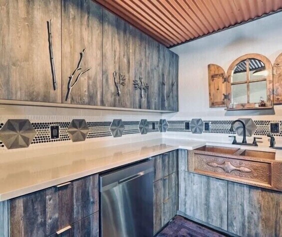 Custom kitchen -copper sink, handmade cabinet hardware, custom tile, stain glass