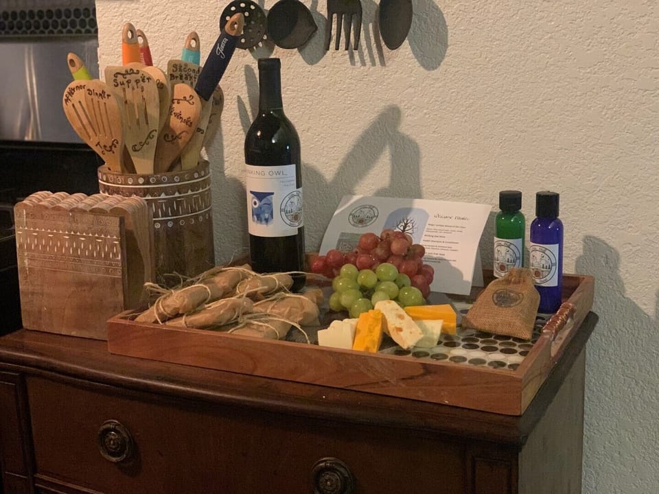 Welcome! Wine, grapes & cheeses, crackers, handmade toiletries & Lembas bread 