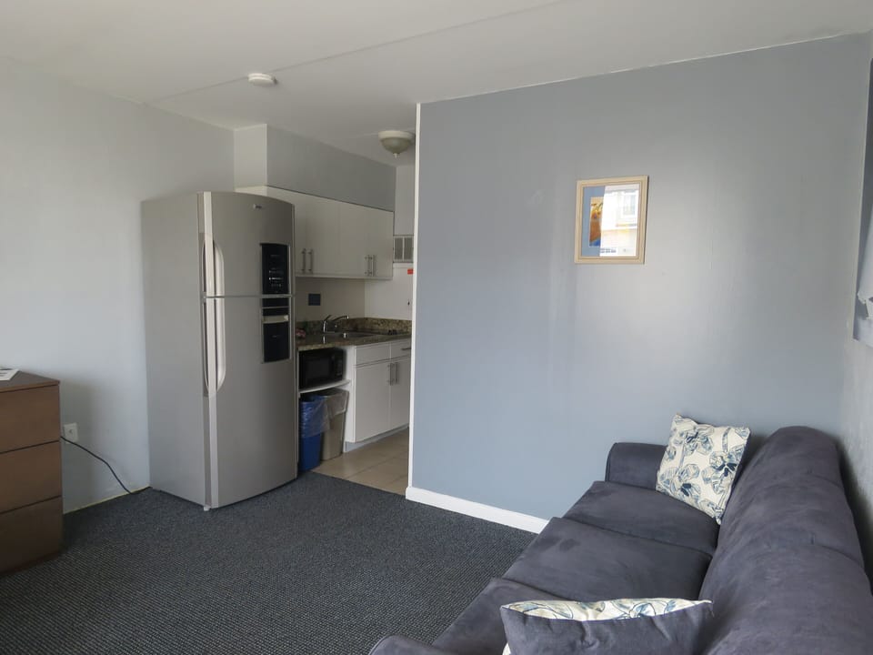 Two Room Suite Kitchenette Oceanview | Living area | 32-inch flat-screen TV with cable channels, TV