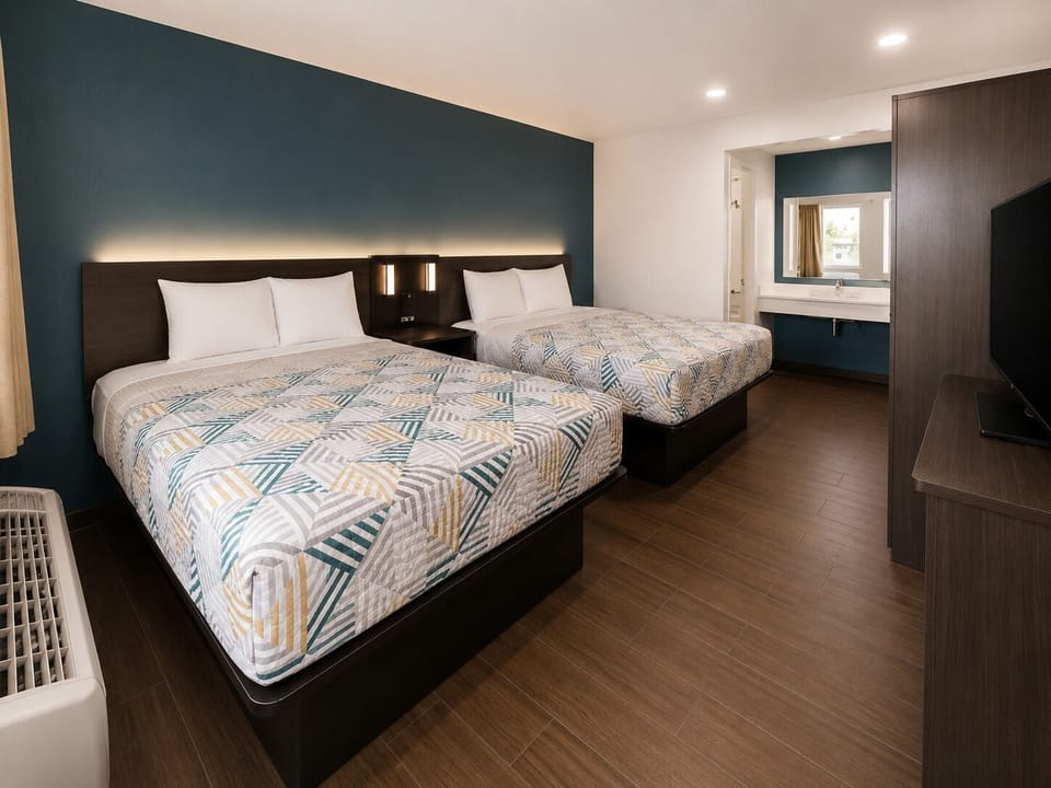 Desk, blackout drapes, free WiFi, bed sheets