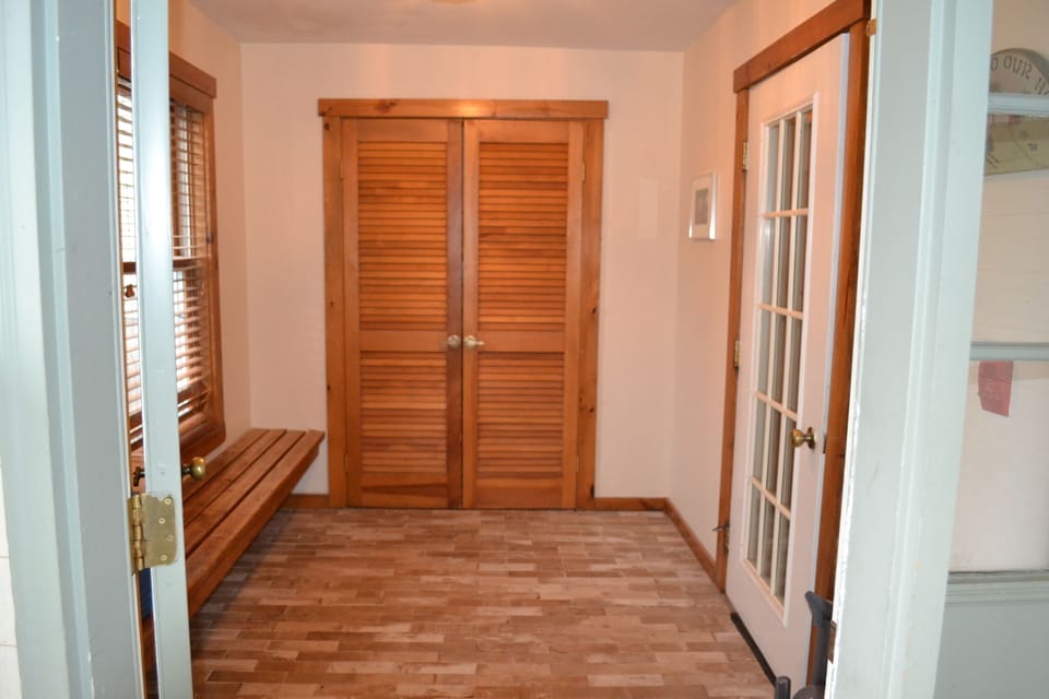 Mud room with large walk in closet