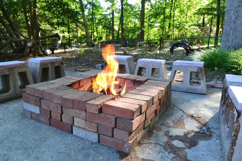 Outdoor firepit in pool deck