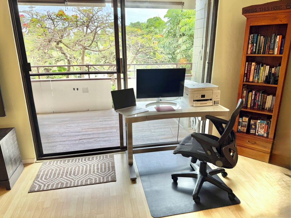 Living Rm office set-up, w/ Hi-speed WiFi, 65" Smart TV, DVD Player, Games/Books