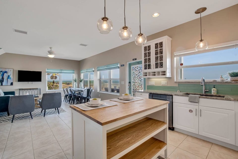 Capture the tranquility of the ocean from the comfort of our living room! This cozy space offers stunning views of the sea.