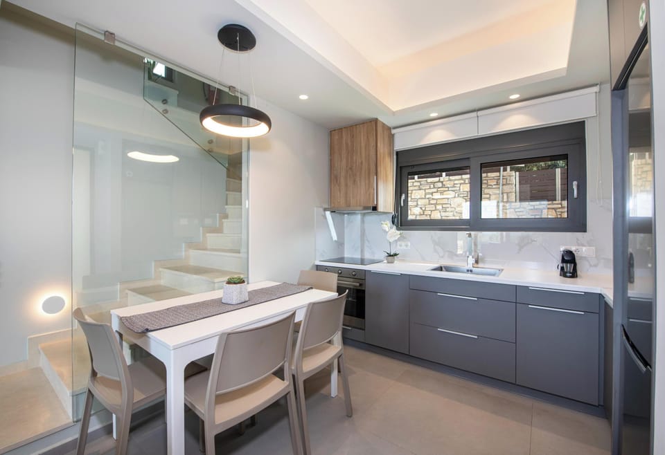Next to the living room you’ll find the the modern fully equipped kitchen which with all necessary appliances for a self catered holiday.