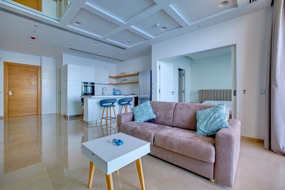 Apartment (1 Bedroom) | Living area | 42-inch TV with cable channels