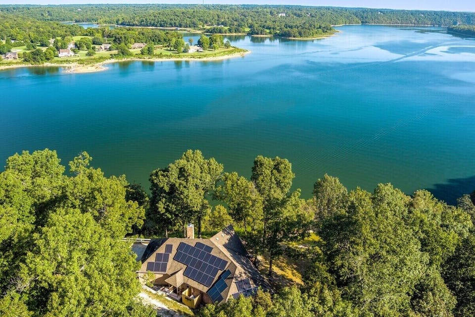 A bird's-eye view of our home, which is surrounded by Beaver Lake on all sides!