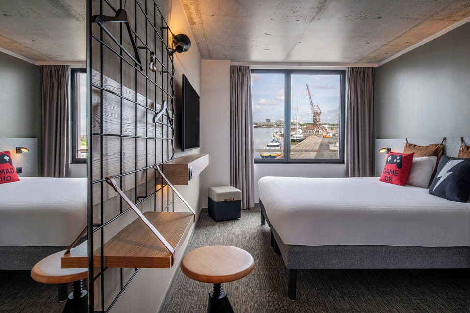 Room, 1 King Bed, Harbor View | Desk, laptop workspace, blackout drapes, soundproofing