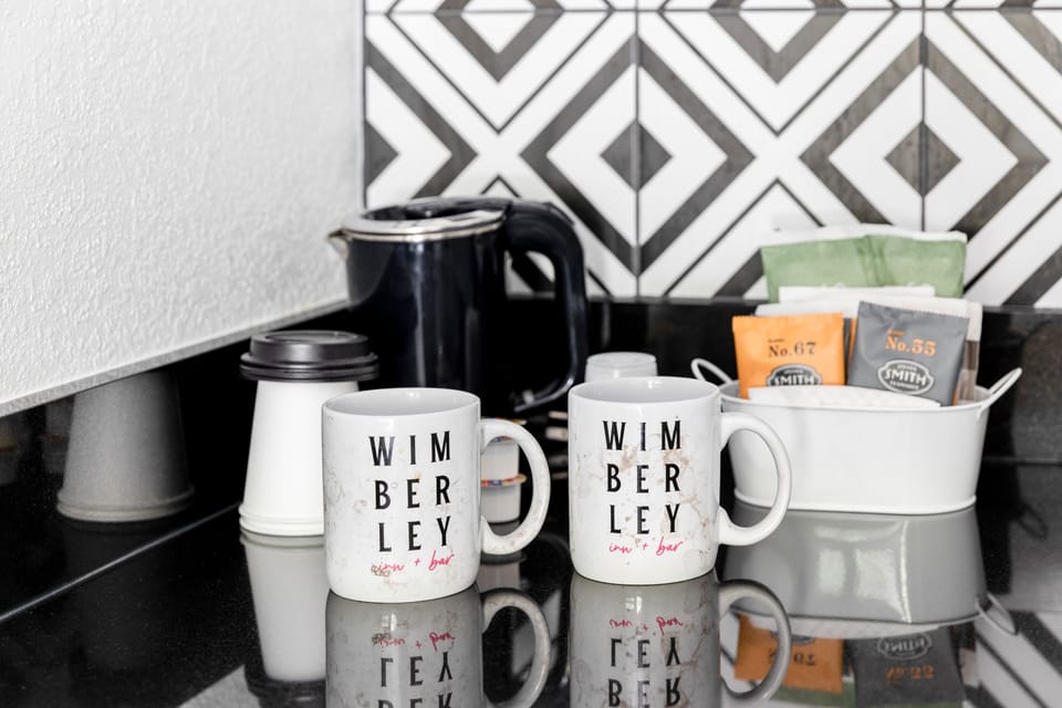 Combined shower/tub, hair dryer, towels, soap