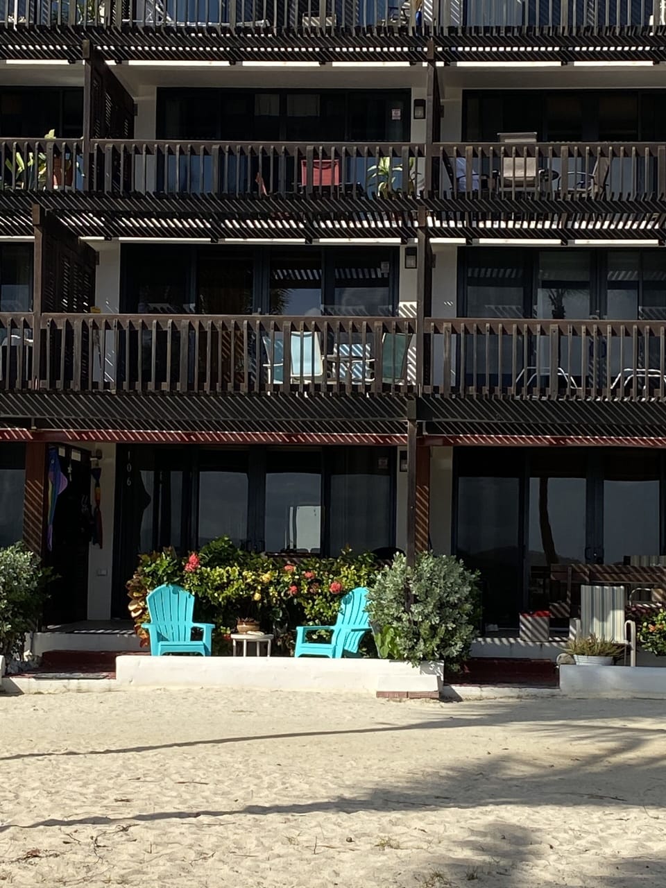 This condo is the one directly above the one with the blue chairs (2nd level)