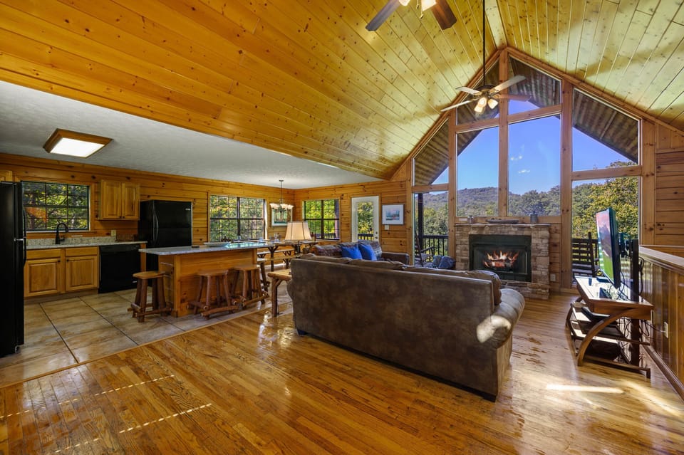 Living area on main level is next to kitchen, with 2 large refrigerator/freezers
