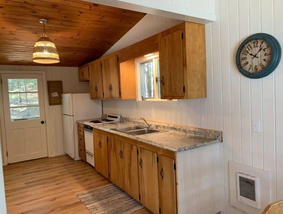 Fully stocked  kitchen with microwave, coffee maker, blender etc