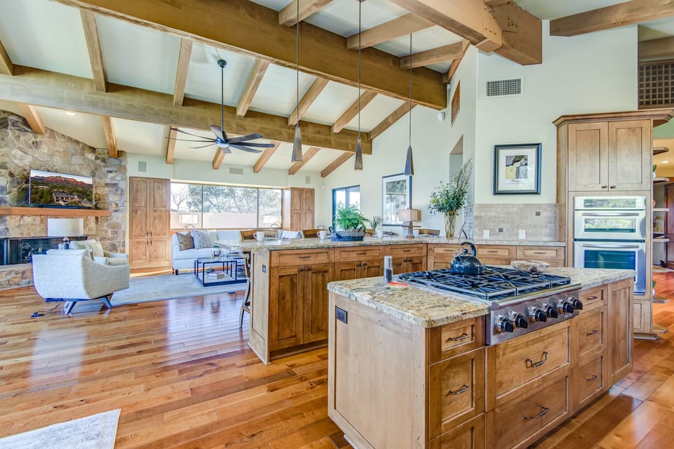 Warm and Open Great Room with Custom Woodwork Throughout