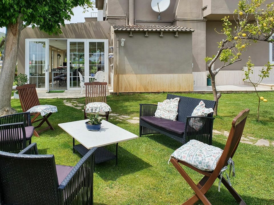 Furniture, Plant, Property, Building, Green, Shade, Chair, Outdoor Furniture, Tree, Grass