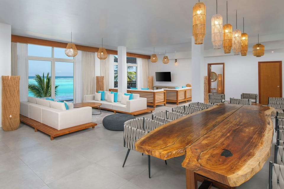 Presidential Villa, 5 Bedrooms, Ocean View (Balcony) | Living room | 55-inch Smart TV with satellite channels, TV