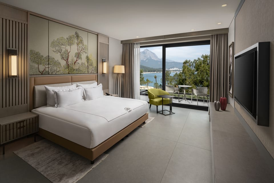 Premium bedding, free minibar items, in-room safe, soundproofing