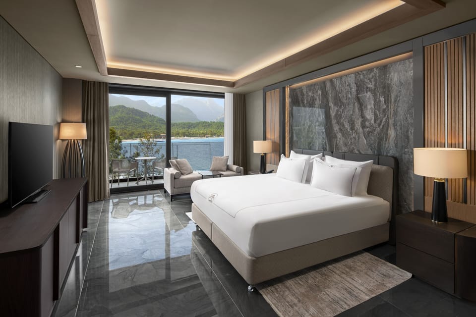 Premium bedding, free minibar items, in-room safe, soundproofing