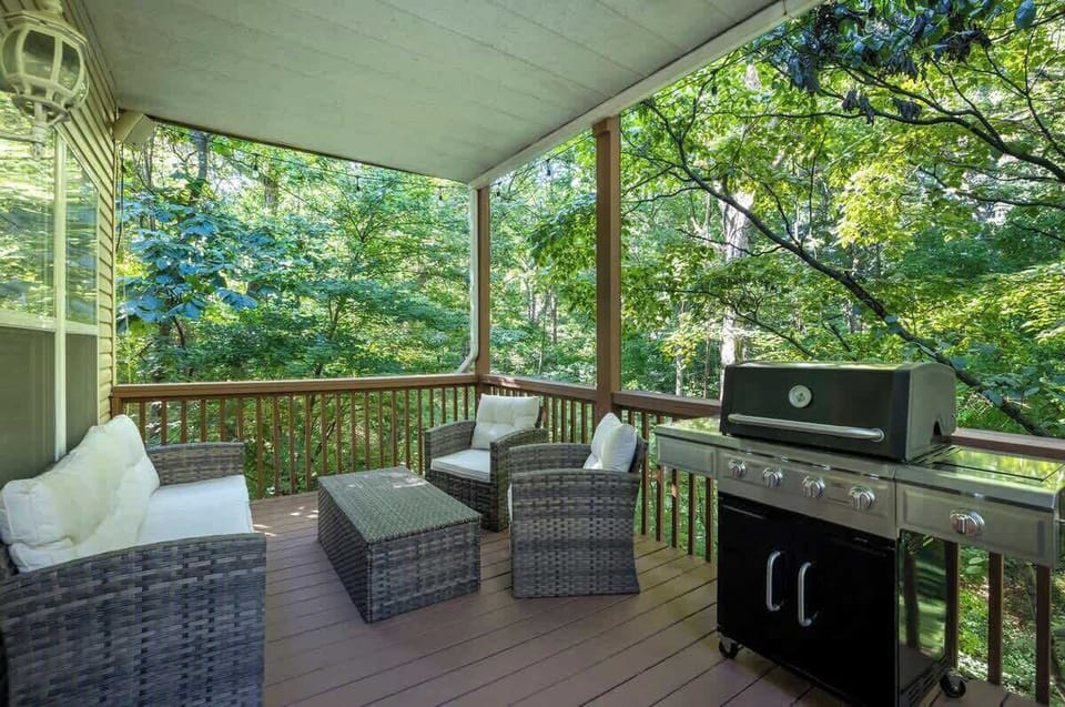 Our home features THREE back decks, all complete with cozy furnishings. Please note that the grill onsite differs from the one shown in this photo.