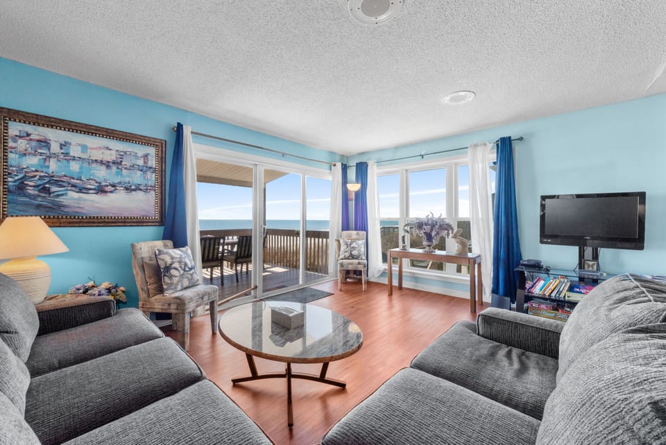 This oceanfront living room offers stunning views!