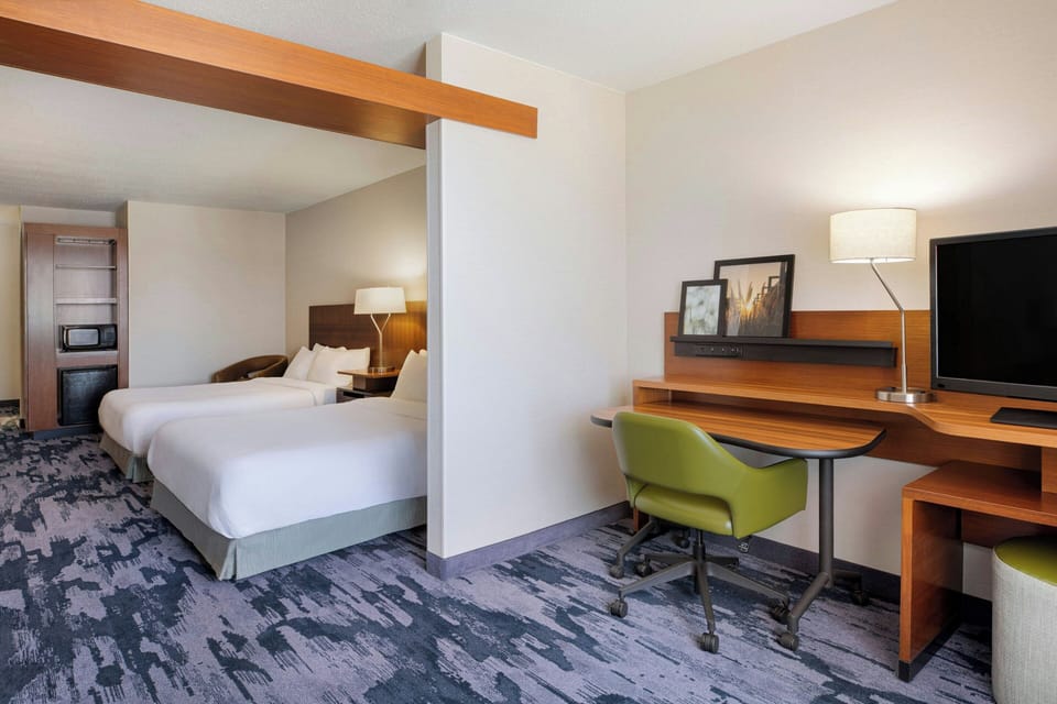 Hypo-allergenic bedding available, in-room safe, desk, laptop workspace