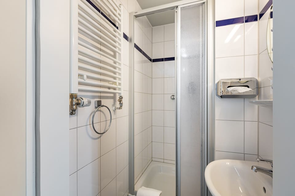 Bed in 4-Bed Dormitory | Bathroom | Shower, eco-friendly toiletries, hair dryer, soap