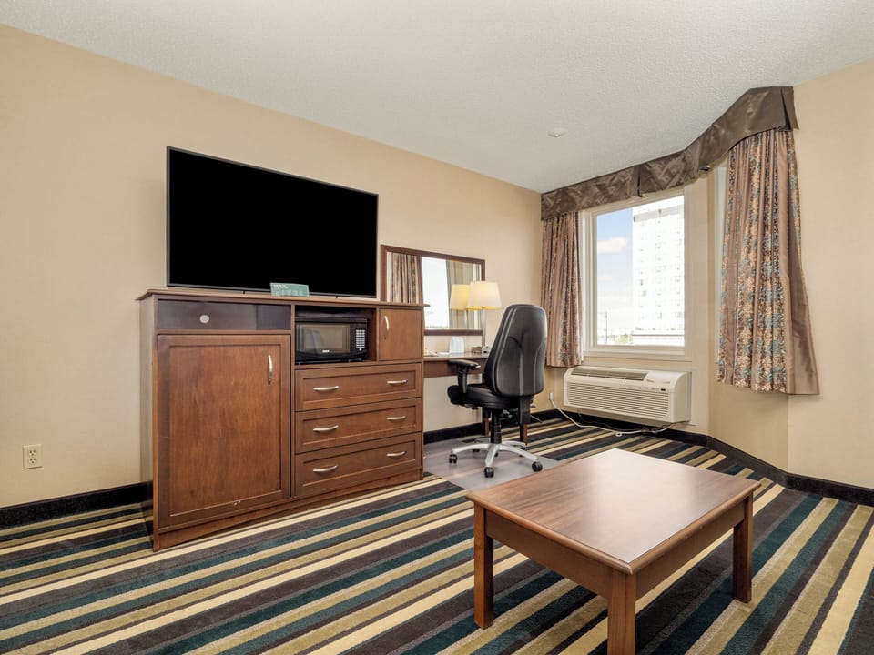 Premium bedding, down comforters, pillowtop beds, desk