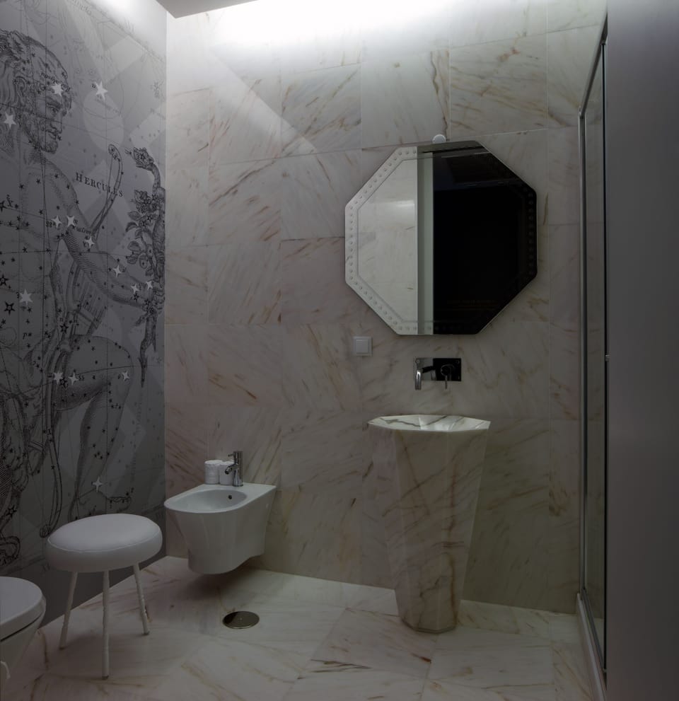 Designer toiletries, hair dryer, bathrobes, slippers