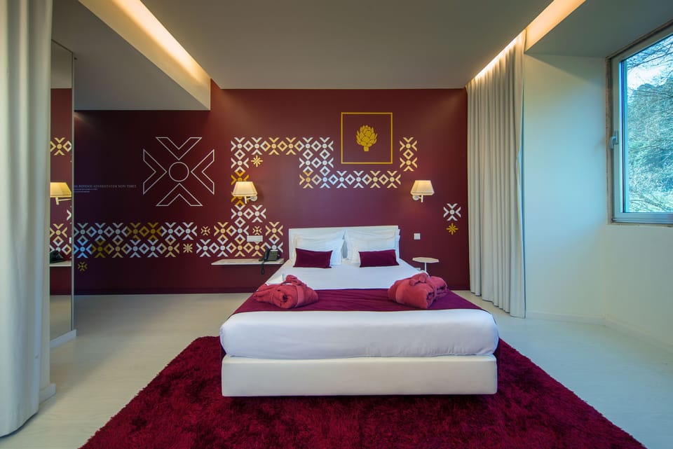 Deluxe Double or Twin Room | Minibar, in-room safe, blackout drapes, soundproofing
