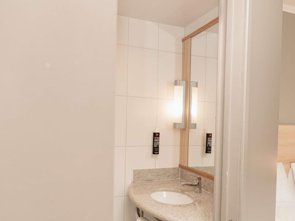 Shower, eco-friendly toiletries, hair dryer, towels