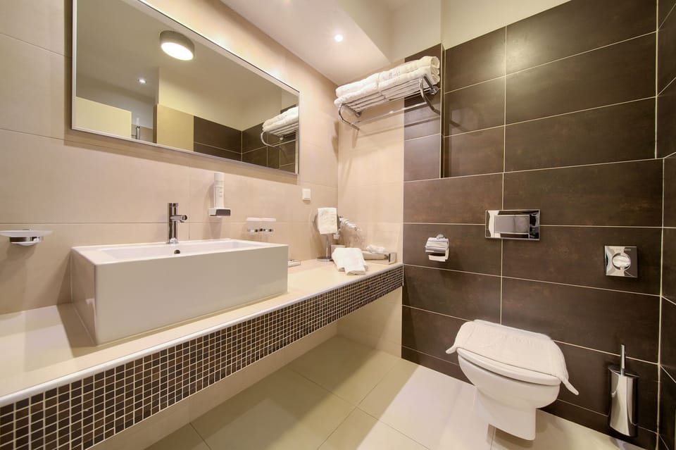 Premium Suite, Sea View | Bathroom | Free toiletries, hair dryer, bathrobes, slippers