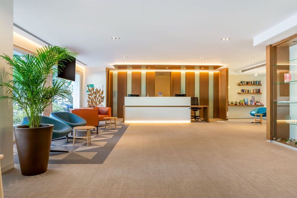 A well-equipped yoga studio with mats and exercise balls, ready for a rejuvenating session.